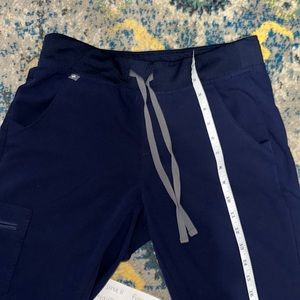 Small figs navy jogger scrubs small bleach mark on back